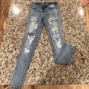 Ripped light wash stretchy skinny jeans
